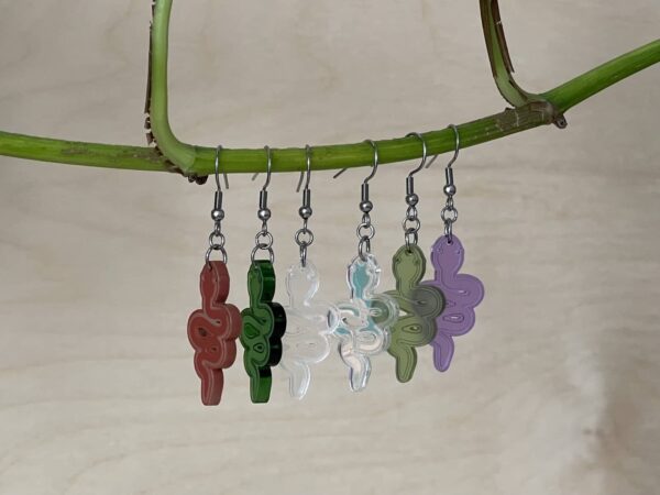 Acrylic snake earrings hanging, in multiple colors