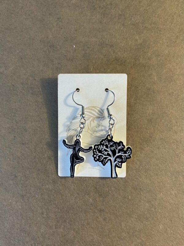 Acrylic yoga tree pose dangle earrings in two-tone black and white.